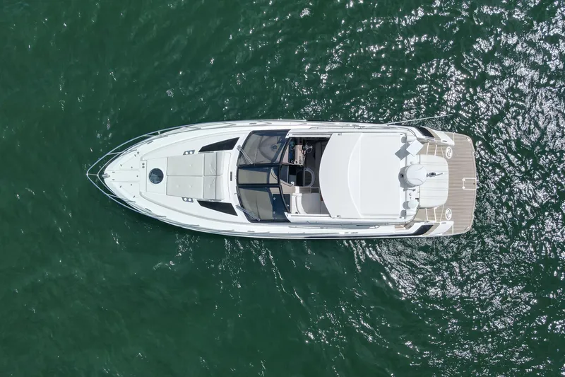Absolutely Yacht Photos Pics Overhead view of 2017 Regal 42 Sport Coupe yacht on open water.
