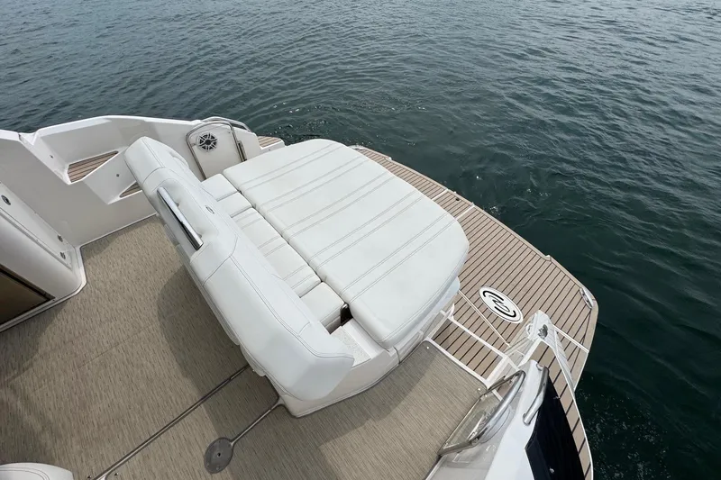 Absolutely Yacht Photos Pics Luxurious 2017 Regal 42 Sport Coupe yacht with spacious deck and seating.