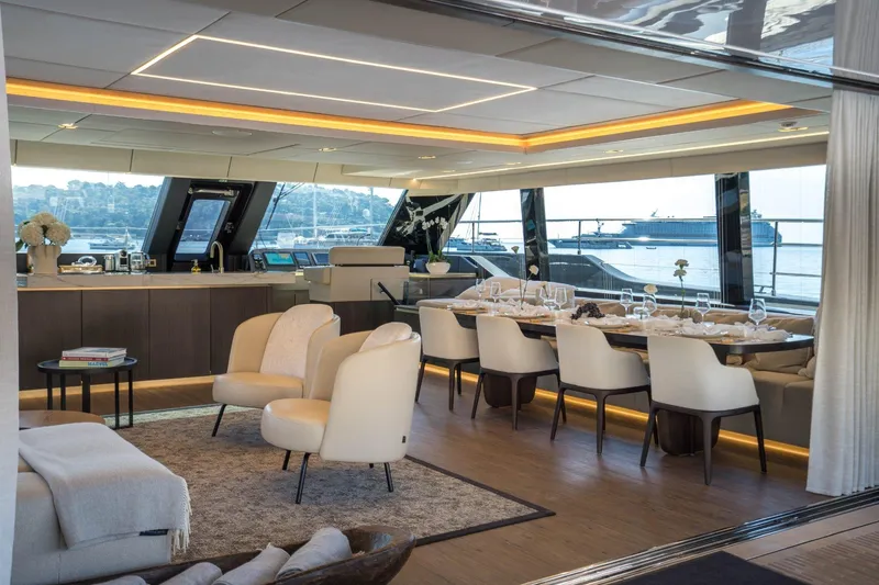 Manta Yacht Photos Pics Luxurious interior of 2022 Sunreef 80 Sunreef Power MANTA yacht with elegant dining area.