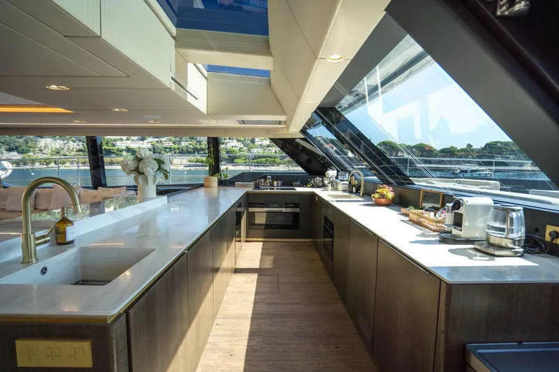 Manta Yacht Photos Pics Luxurious kitchen interior of 2022 Sunreef 80 Sunreef Power MANTA yacht with modern amenities.