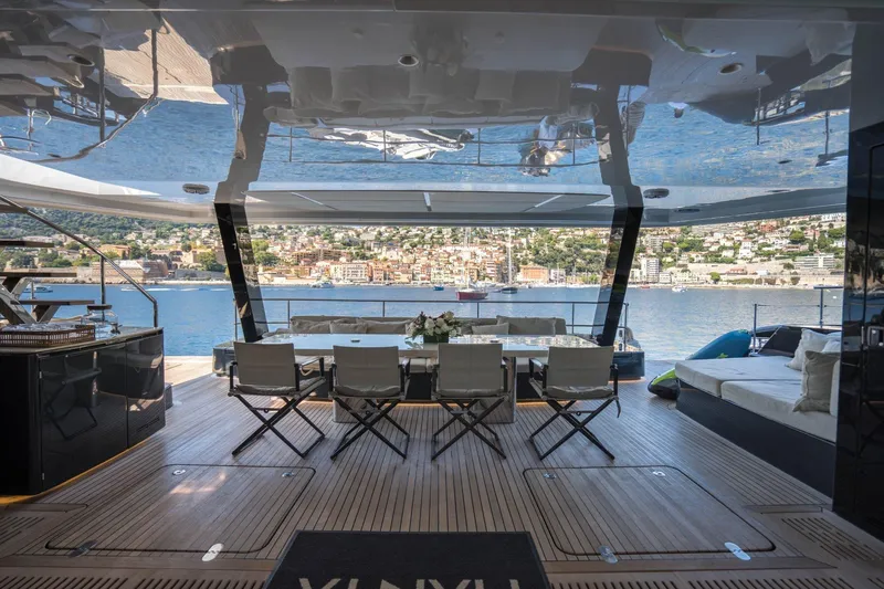 Manta Yacht Photos Pics Luxurious 2022 Sunreef 80 Power MANTA yacht deck with stunning waterfront view.