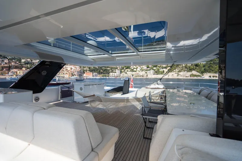 Manta Yacht Photos Pics Luxurious 2022 Sunreef 80 Sunreef Power MANTA yacht deck with seating and ocean view.