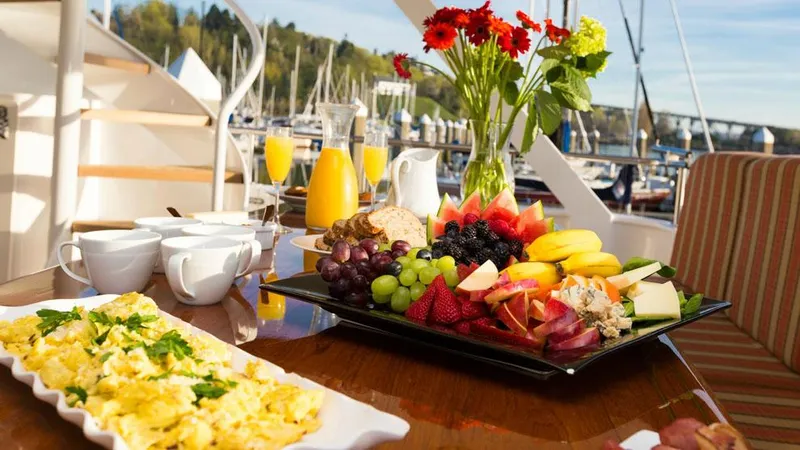 Blackwood Yacht Photos Pics Luxurious yacht breakfast with fresh fruit, scrambled eggs, and orange juice on Broward 103, 1998.