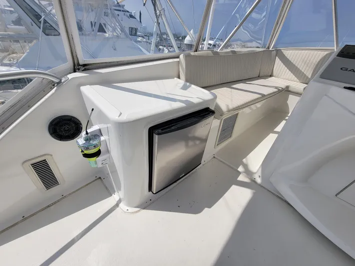  Yacht Photos Pics 2001 Ocean Yachts 56 Super Sport cockpit with seating and mini fridge.