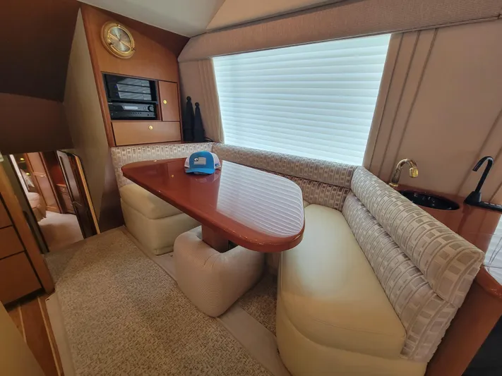  Yacht Photos Pics Luxurious dining area in a 2001 Ocean Yachts 56 Super Sport boat.