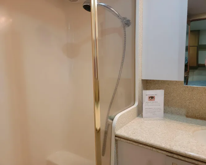  Yacht Photos Pics 2001 Ocean Yachts 56 Super Sport bathroom with shower and vanity.