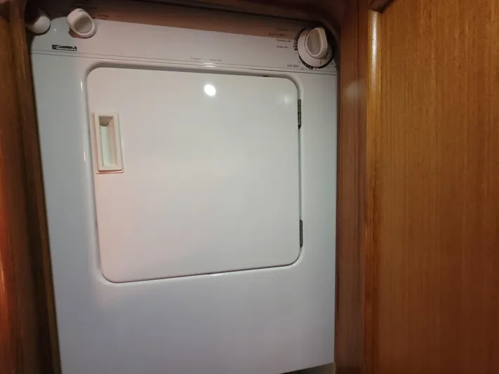  Yacht Photos Pics Laundry dryer inside 2001 Ocean Yachts 56 Super Sport.