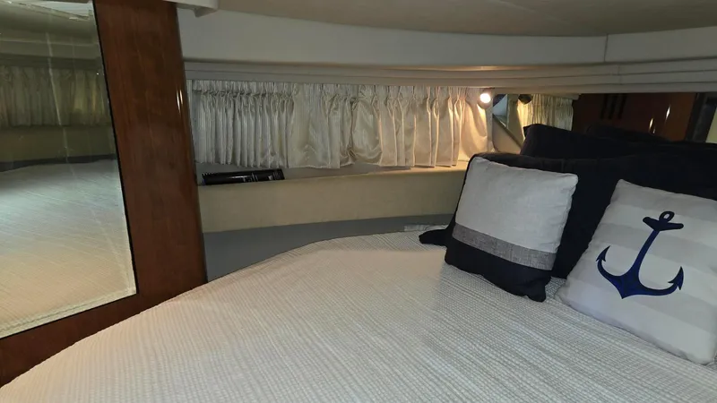 One More Time Yacht Photos Pics Interior cabin of 2004 Sea Ray 380 Sundancer with nautical-themed decor.