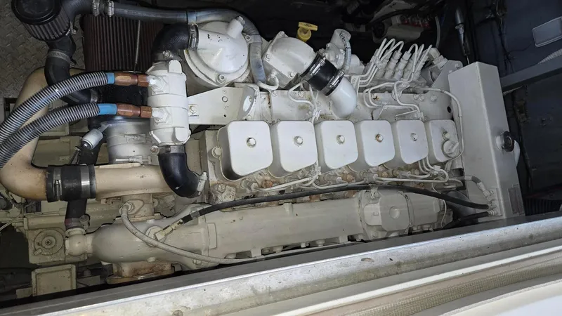 One More Time Yacht Photos Pics Engine of a 2004 Sea Ray 380 Sundancer boat, detailed view.
