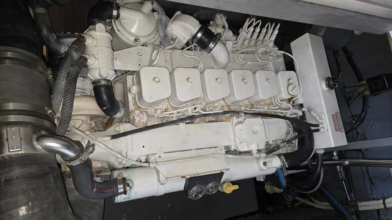One More Time Yacht Photos Pics Engine compartment of a 2004 Sea Ray 380 Sundancer boat.