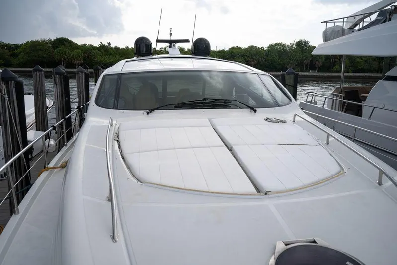 Chopin Yacht Photos Pics 2007 Pershing 62' yacht docked, showcasing sleek design and modern features.