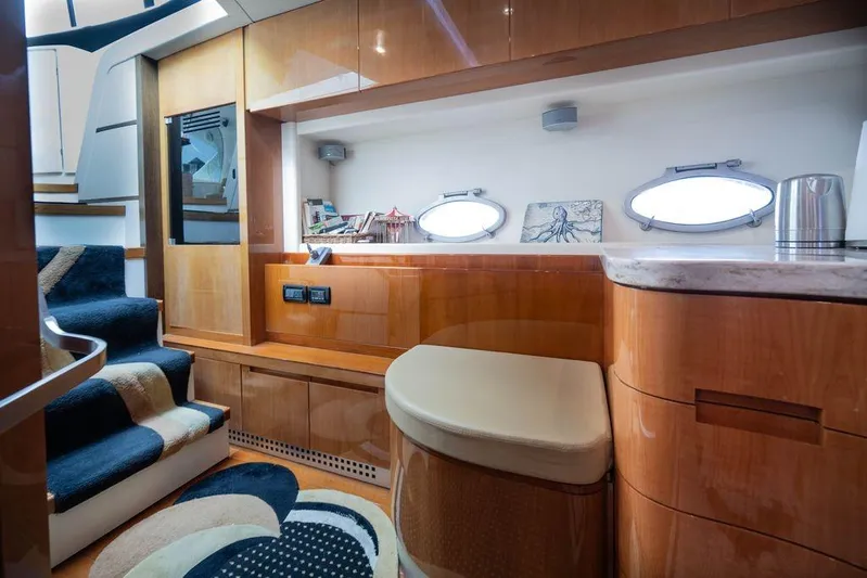 Chopin Yacht Photos Pics Luxurious interior of 2007 Pershing 62' yacht with elegant wood finishes and modern design.