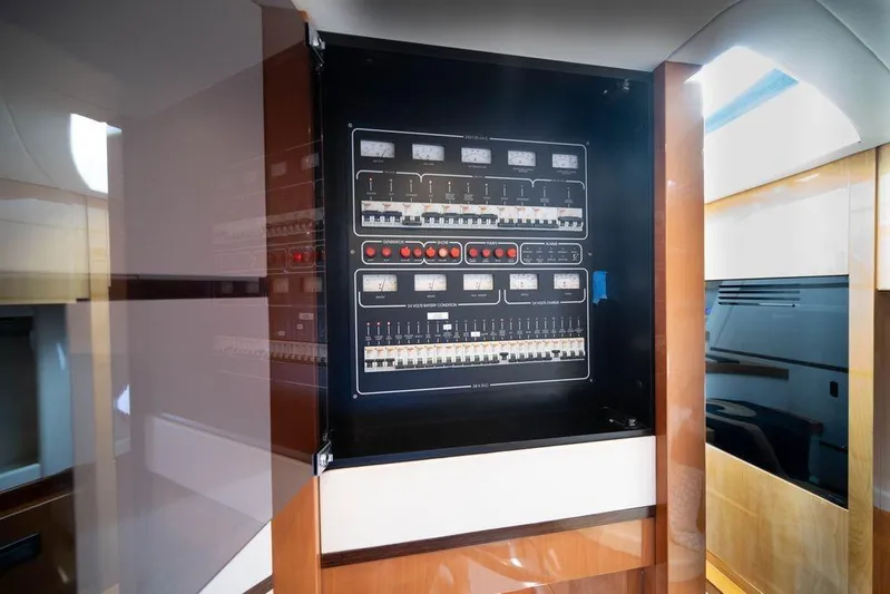Chopin Yacht Photos Pics Electrical control panel inside 2007 Pershing 62' yacht, featuring switches and meters.