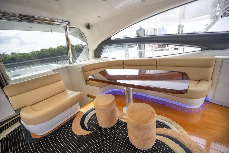 Chopin Yacht Photos Pics Luxurious interior of a 2007 Pershing 62' yacht with elegant seating and modern design.