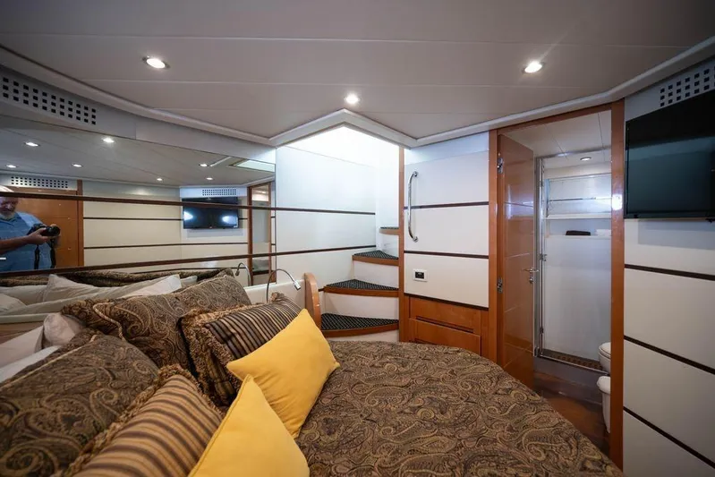 Chopin Yacht Photos Pics Luxurious interior of 2007 Pershing 62' yacht with elegant bedroom and modern bathroom.