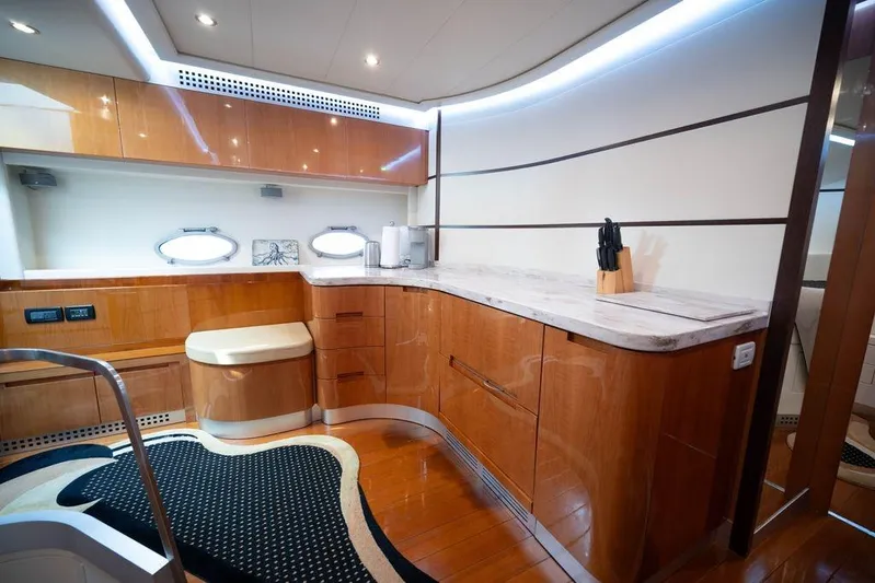 Chopin Yacht Photos Pics Luxurious 2007 Pershing 62' yacht interior with modern kitchen and elegant wood finishes.