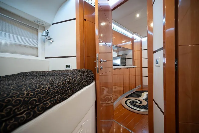 Chopin Yacht Photos Pics Luxurious interior of 2007 Pershing 62' yacht featuring elegant wood finishes and modern design.