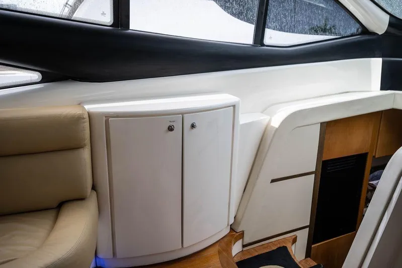 Chopin Yacht Photos Pics Interior of 2007 Pershing 62' yacht with sleek cabinetry and modern design.