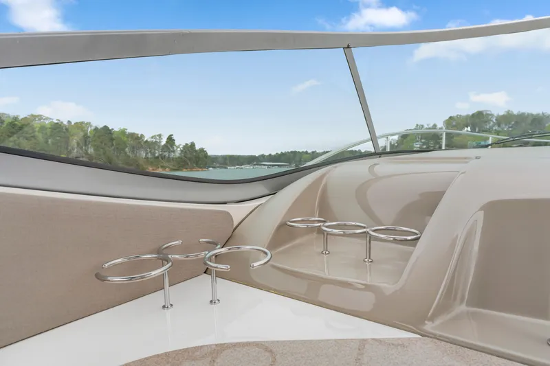 Beau Dacious Yacht Photos Pics 2007 Sea Ray 310 Sundancer interior with cup holders and scenic water view.