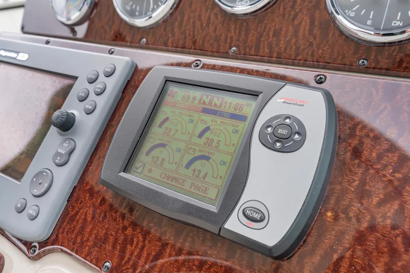 Beau Dacious Yacht Photos Pics Dashboard of 2007 Sea Ray 310 Sundancer with navigation and control systems.