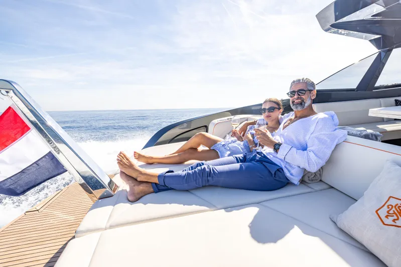  Yacht Photos Pics Couple relaxing on Bekkers Yachts Azur 45, 2026 model, enjoying a sunny day at sea.