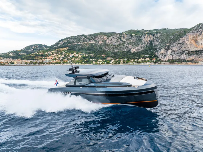  Yacht Photos Pics Bekkers Yachts Azur 45 cruising on the sea, 2026 model, with scenic coastal backdrop.