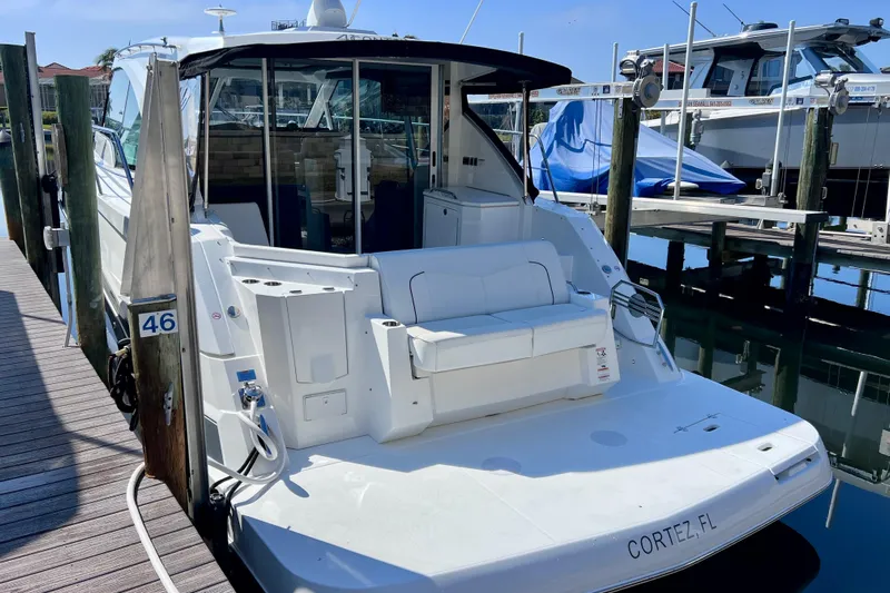  Yacht Photos Pics 2018 Cruisers Yachts 41 Cantius docked, rear view, in Cortez, Florida marina.