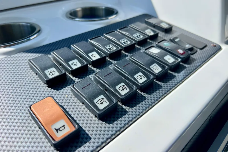  Yacht Photos Pics Control panel of 2018 Cruisers Yachts 41 Cantius with labeled switches.