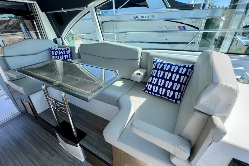  Yacht Photos Pics 2018 Cruisers Yachts 41 Cantius interior with sleek seating and modern table design.