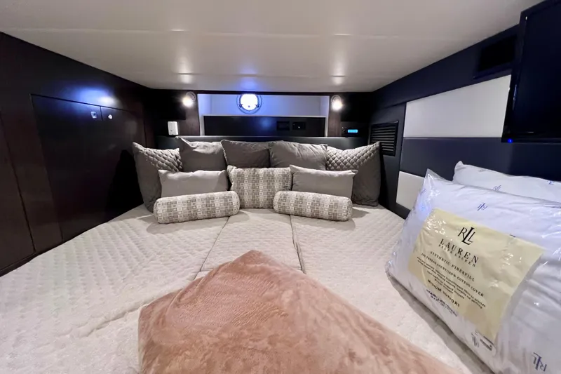  Yacht Photos Pics Luxurious 2018 Cruisers Yachts 41 Cantius cabin interior with plush bedding and elegant decor.