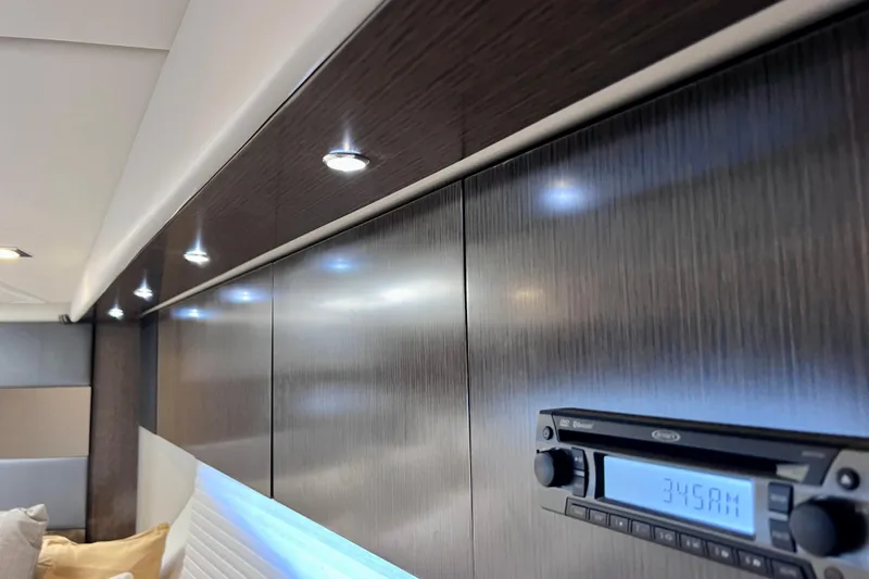  Yacht Photos Pics Interior of 2018 Cruisers Yachts 41 Cantius with sleek wood paneling and modern lighting.