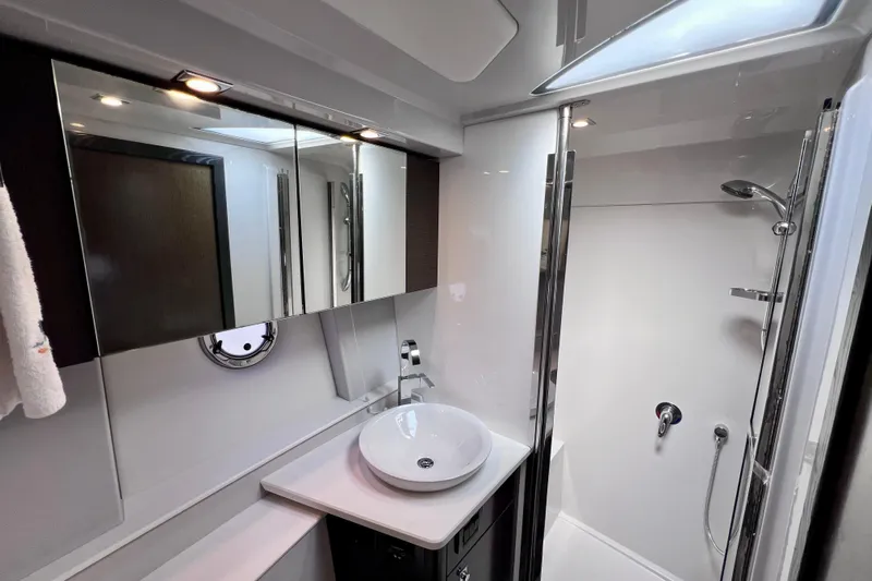  Yacht Photos Pics Luxurious bathroom in 2018 Cruisers Yachts 41 Cantius with modern fixtures and shower.