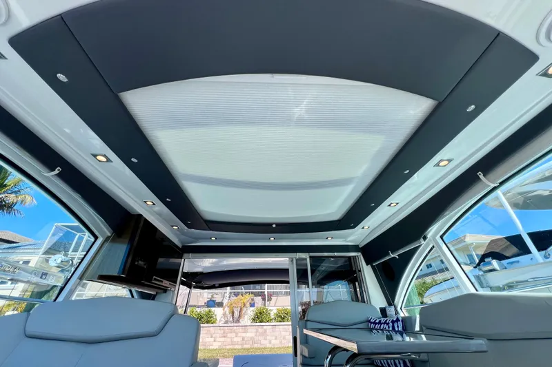  Yacht Photos Pics Interior view of 2018 Cruisers Yachts 41 Cantius, featuring modern seating and sleek design.