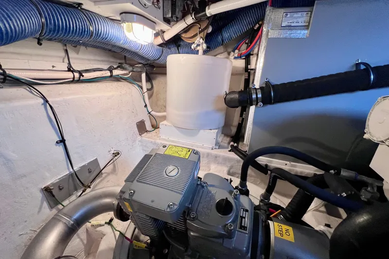  Yacht Photos Pics Engine room of 2018 Cruisers Yachts 41 Cantius with visible machinery and wiring.