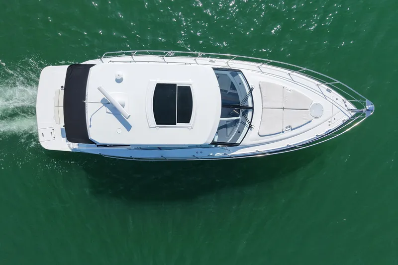  Yacht Photos Pics Overhead view of 2018 Cruisers Yachts 41 Cantius on green water.