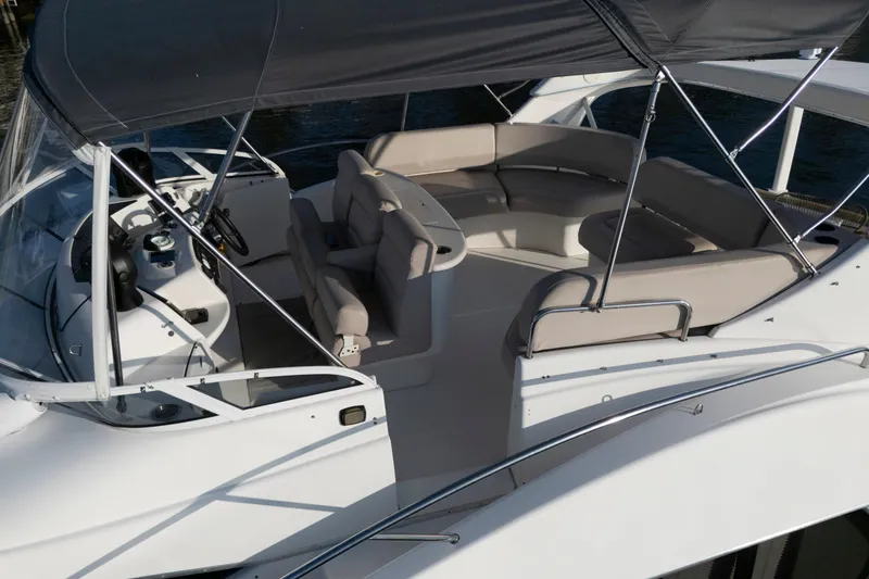 Good Medicine Yacht Photos Pics 2004 Silverton 43 Motor Yacht with spacious seating and covered helm area.