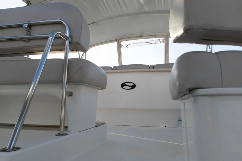Good Medicine Yacht Photos Pics 2004 Silverton 43 Motor Yacht interior with cushioned seating and sleek design.
