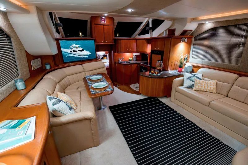 Good Medicine Yacht Photos Pics Luxurious interior of 2004 Silverton 43 Motor Yacht with elegant seating and modern amenities.