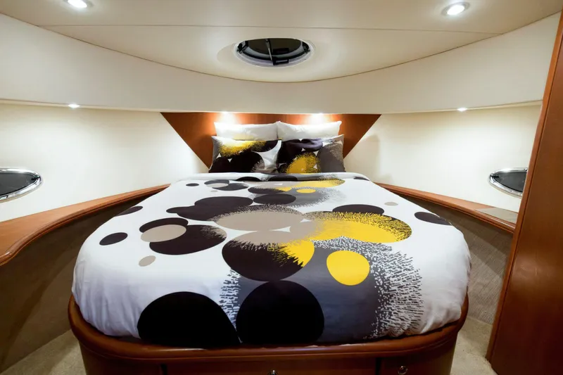 Good Medicine Yacht Photos Pics Luxurious bedroom interior of 2004 Silverton 43 Motor Yacht with modern bedding design.