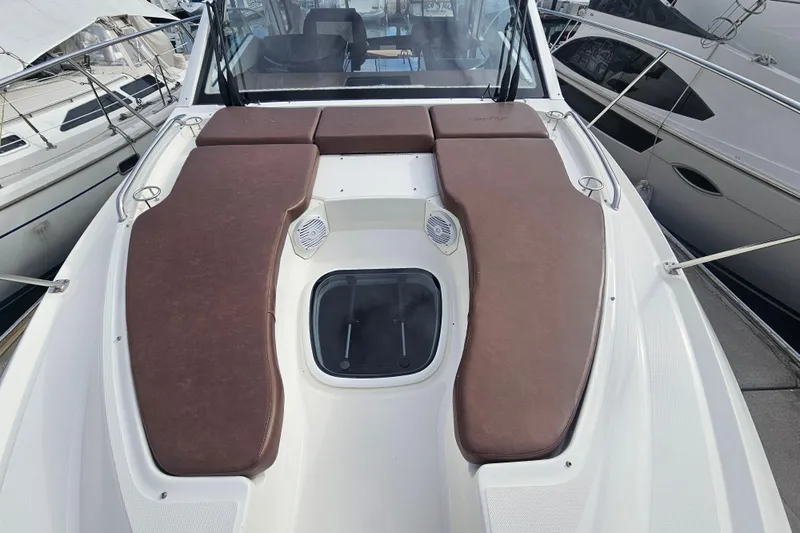 Levon II Yacht Photos Pics 2017 Sea Ray Sundancer 350 Coupe with brown sun pads on deck.