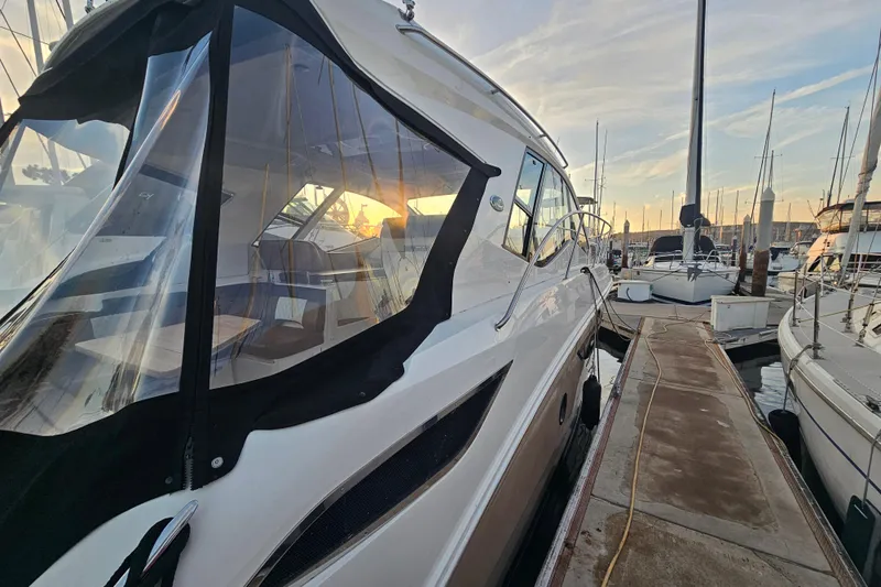 Levon II Yacht Photos Pics 2017 Sea Ray Sundancer 350 Coupe docked at marina during sunset.