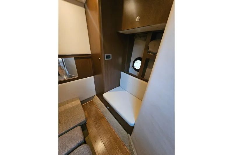 Levon II Yacht Photos Pics 2017 Sea Ray Sundancer 350 Coupe interior with seating and wood accents.