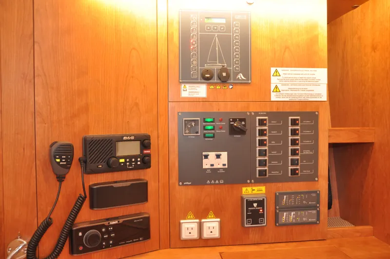 Avalon Sunset Yacht Photos Pics Control panel of a 2016 Hanse 505 yacht, featuring navigation and communication equipment.