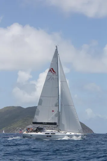 Avalon Sunset Yacht Photos Pics 2016 Hanse 505 sailboat navigating open sea with island backdrop.