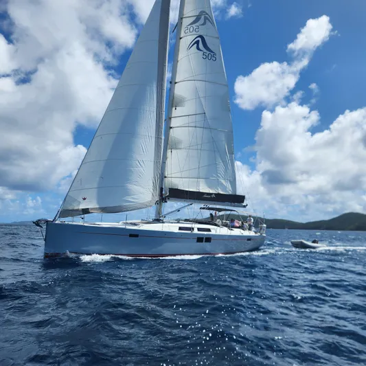 Avalon Sunset Yacht Photos Pics 2016 Hanse 505 sailboat navigating blue ocean under clear skies.