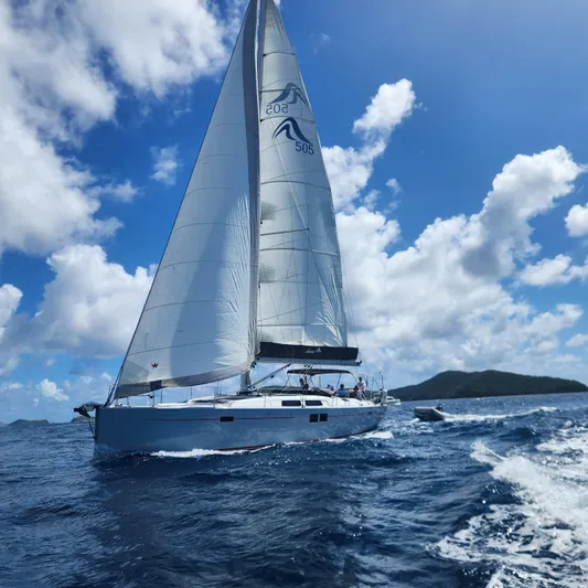 Avalon Sunset Yacht Photos Pics Sailing yacht Hanse 505, 2016 model, gliding on blue ocean under clear sky.
