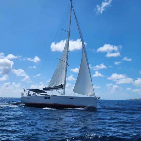 Avalon Sunset Yacht Photos Pics Sailing yacht Hanse 505, 2016 model, gliding on open sea under clear blue sky.