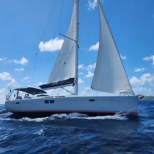 Avalon Sunset Yacht Photos Pics 2016 Hanse 505 sailboat cruising on open sea under clear blue sky.