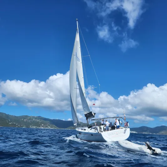 Avalon Sunset Yacht Photos Pics Sailing yacht Hanse 505, 2016 model, cruising on blue ocean under clear sky.