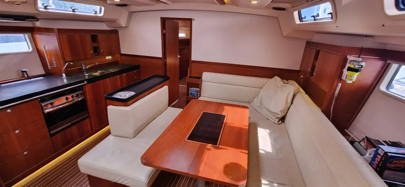 Avalon Sunset Yacht Photos Pics Interior of 2016 Hanse 505 yacht with kitchen and seating area.